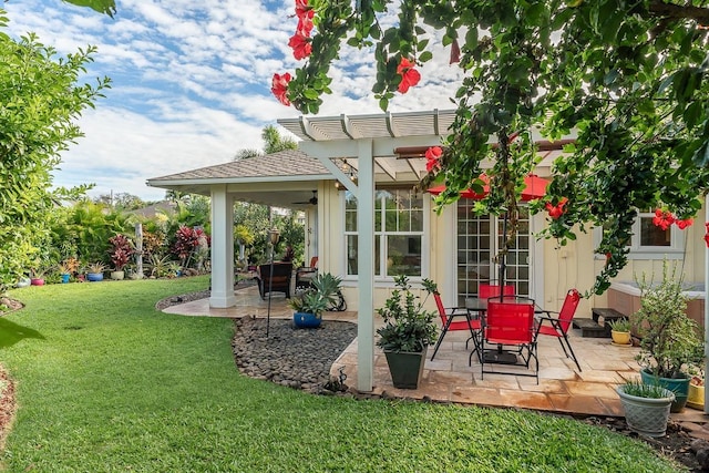 view of patio with french doors and a pergola