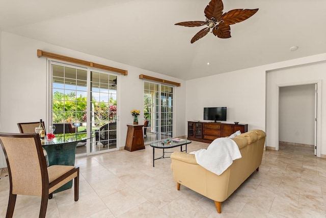 living room featuring lofted ceiling and ceiling fan