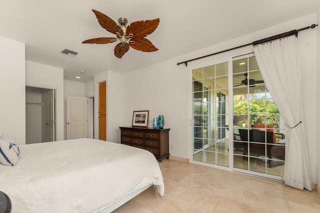 bedroom with access to outside and ceiling fan