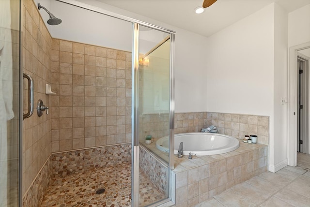 bathroom featuring independent shower and bath and tile patterned flooring