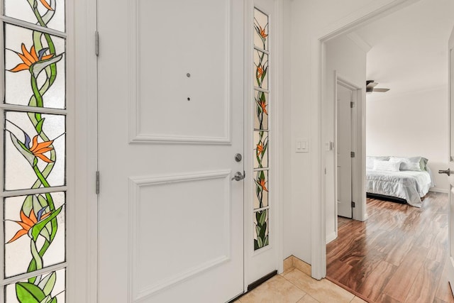 doorway to outside with light wood-type flooring