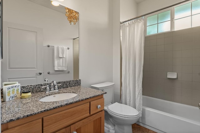 full bathroom with vanity, shower / bath combination with curtain, and toilet