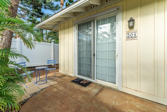 property entrance with a patio area