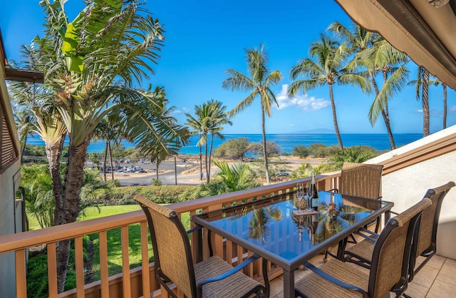 balcony featuring a water view