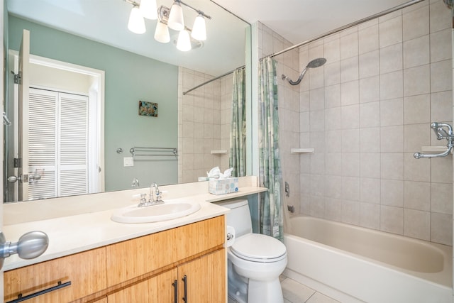 full bathroom with tile patterned flooring, vanity, shower / bath combo, and toilet