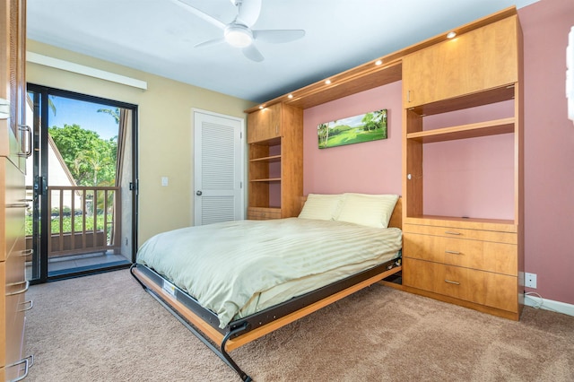 carpeted bedroom featuring access to exterior, a closet, and ceiling fan