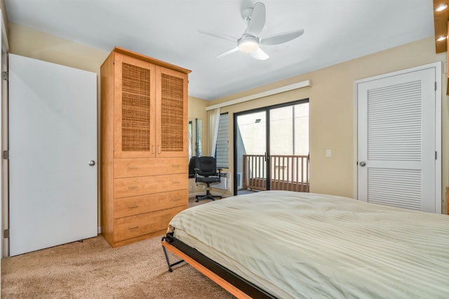 bedroom featuring access to exterior, ceiling fan, a closet, and light carpet