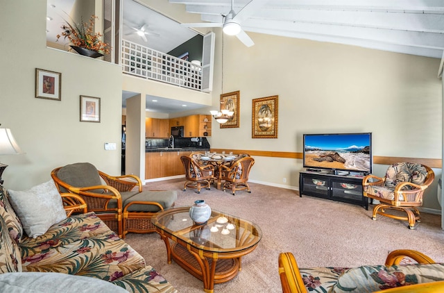 living room with carpet, ceiling fan, sink, high vaulted ceiling, and beamed ceiling