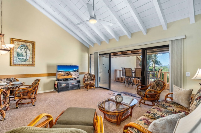 carpeted living room with ceiling fan, beamed ceiling, and high vaulted ceiling