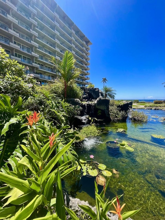 exterior space featuring a small pond