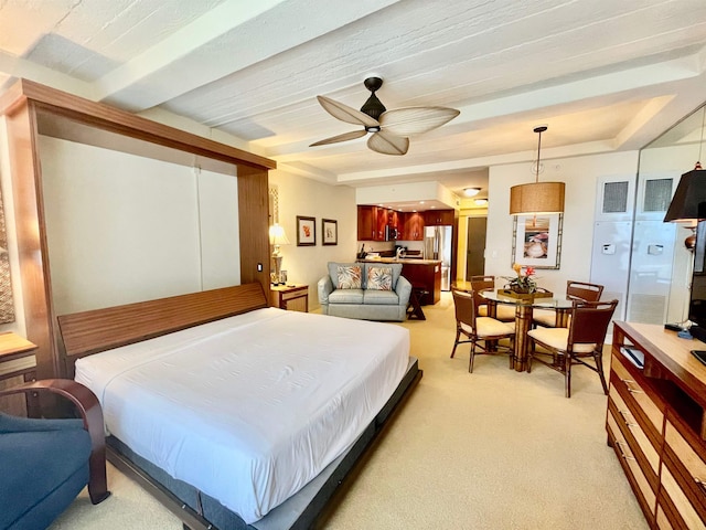 carpeted bedroom with ceiling fan, beam ceiling, and stainless steel fridge