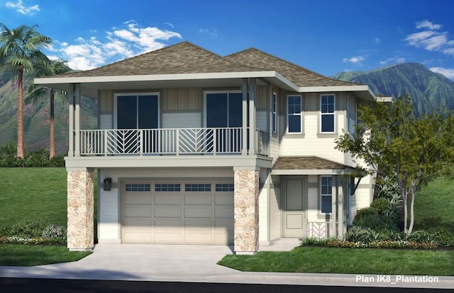 view of front of property featuring concrete driveway, an attached garage, board and batten siding, a mountain view, and a front lawn