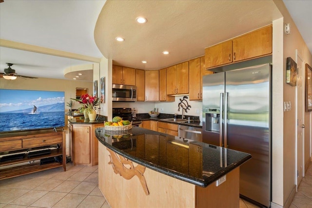 2936 S Kihei Rd Unit 213, Kihei, HI 96753 - kitchen with appliances with stainless steel finishes, light tile patterned flooring, a sink, recessed lighting, and a ceiling fan