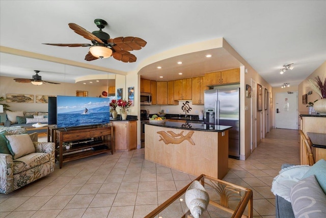 2936 S Kihei Rd Unit 213, Kihei, HI 96753 - kitchen with stainless steel appliances, open floor plan, light tile patterned floors, a sink, and recessed lighting