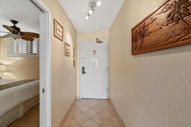 2936 S Kihei Rd Unit 213, Kihei, HI 96753 - corridor with baseboards and light tile patterned floors