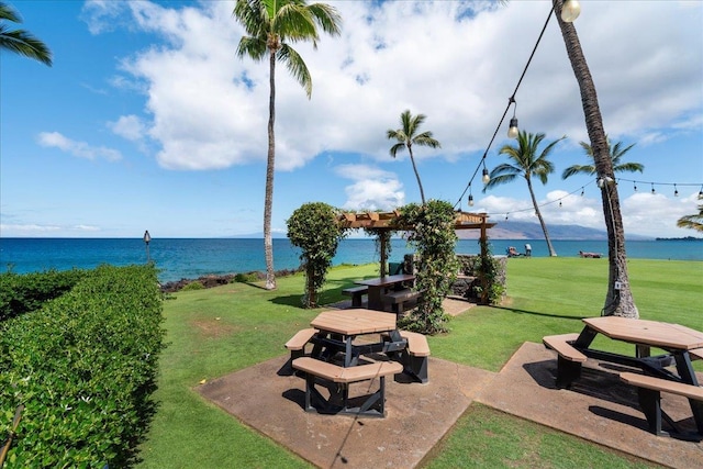 2936 S Kihei Rd Unit 213, Kihei, HI 96753 - view of property's community featuring a water view, a yard, and a patio