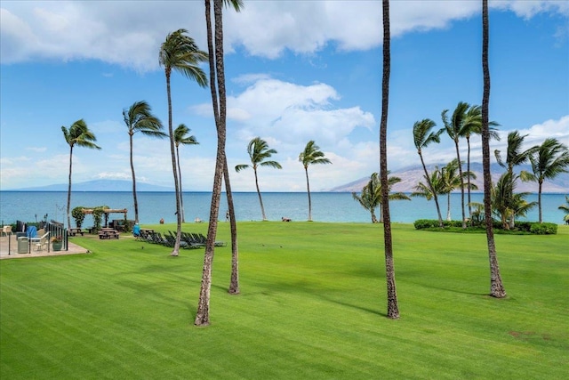 2936 S Kihei Rd Unit 213, Kihei, HI 96753 - view of property's community with a water view, a lawn, and golf course view
