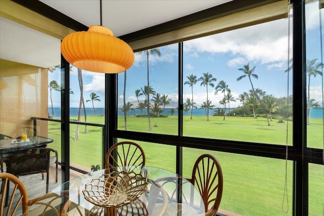 2936 S Kihei Rd Unit 213, Kihei, HI 96753 - sunroom / solarium featuring a water view and healthy amount of natural light