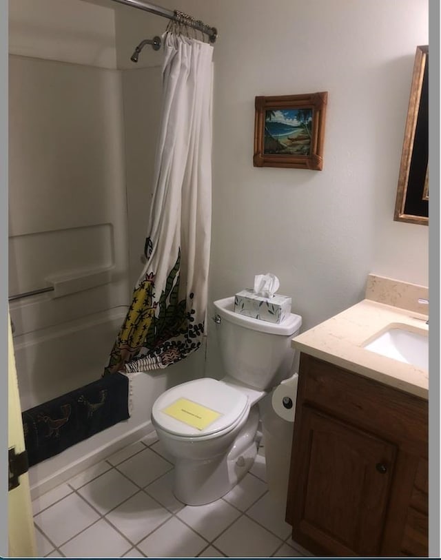 full bathroom featuring vanity, shower / tub combo with curtain, toilet, and tile patterned flooring