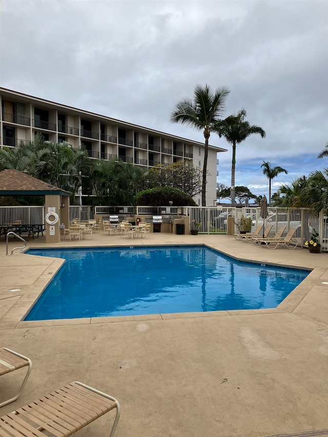 view of pool featuring a patio