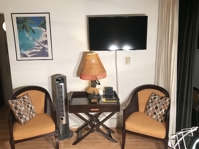 living area featuring hardwood / wood-style flooring