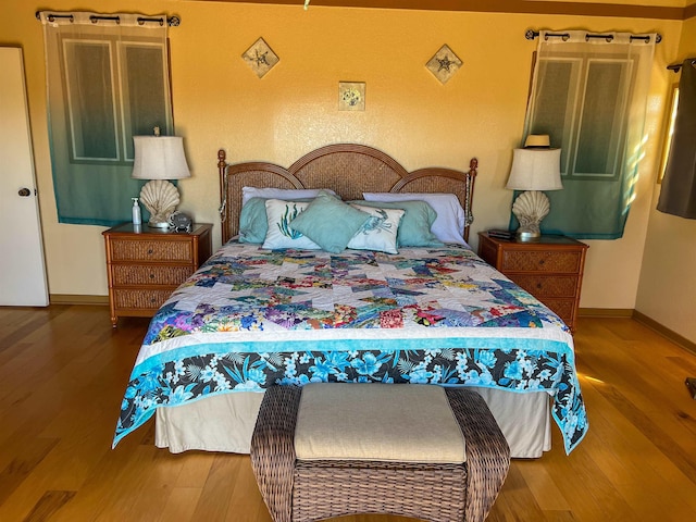 bedroom with wood-type flooring