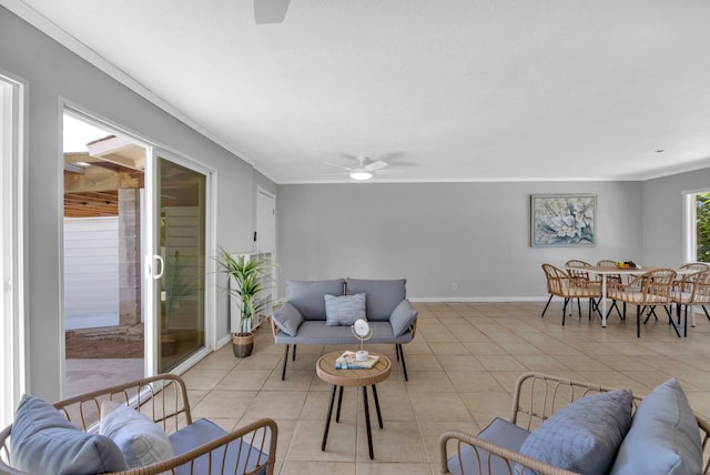 tiled living room with a wealth of natural light, ornamental molding, and ceiling fan