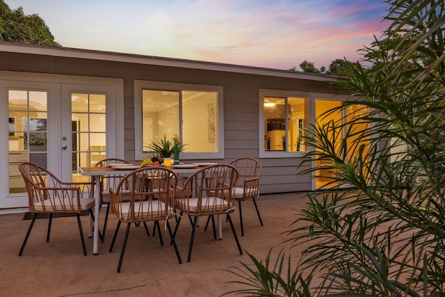 view of patio terrace at dusk