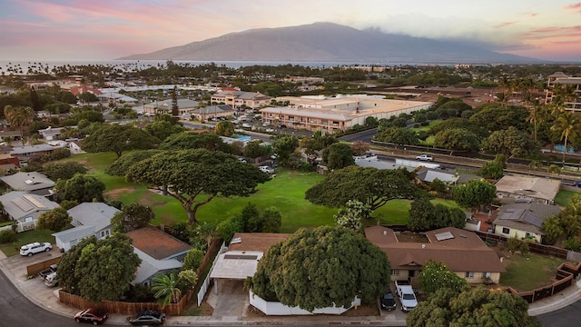 aerial view at dusk with a mountain view