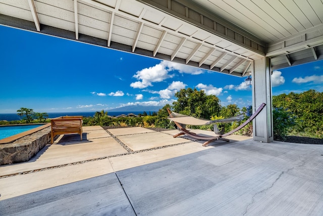 view of patio / terrace featuring a water view