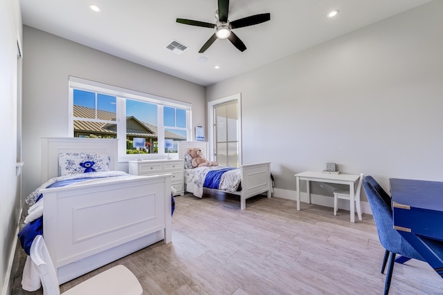 bedroom featuring ceiling fan and light hardwood / wood-style floors