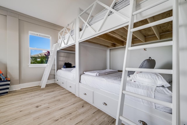 bedroom with hardwood / wood-style flooring