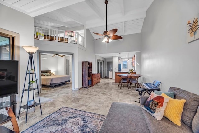 3788 Lower Honoapiilani Rd Unit A211, Lahaina, HI 96761 - living area featuring ceiling fan, high vaulted ceiling, beam ceiling, and baseboards