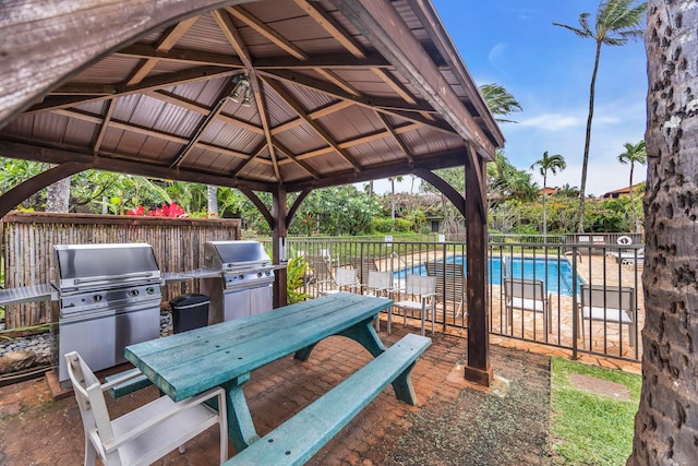 3788 Lower Honoapiilani Rd Unit A211, Lahaina, HI 96761 - view of patio featuring a gazebo, outdoor dining area, area for grilling, and fence