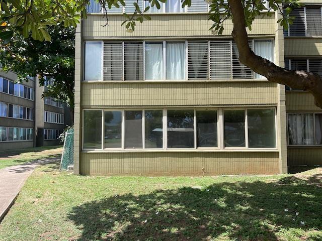 111 Kahului Beach Rd Unit A127, Kahului, HI 96732 - view of side of home featuring a lawn