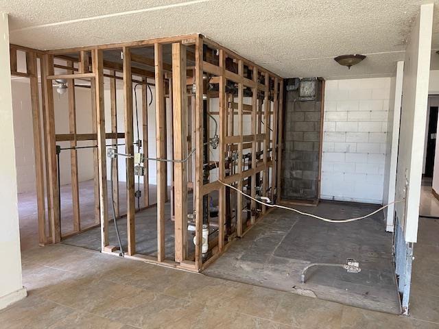 111 Kahului Beach Rd Unit A127, Kahului, HI 96732 - misc room featuring a textured ceiling and concrete block wall