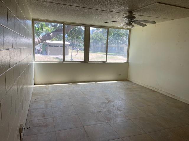 111 Kahului Beach Rd Unit A127, Kahului, HI 96732 - unfurnished sunroom featuring plenty of natural light