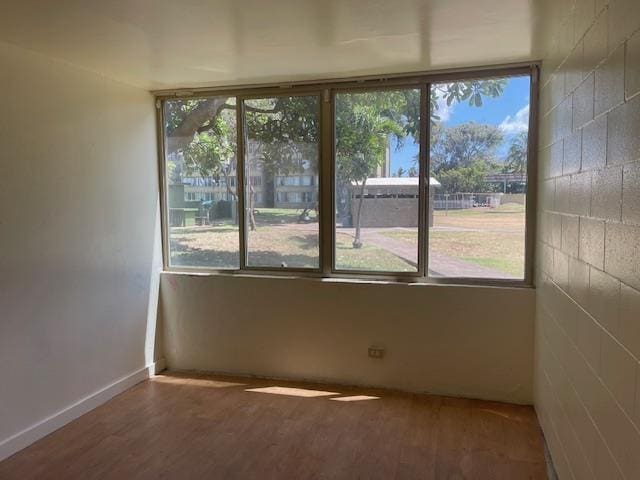111 Kahului Beach Rd Unit A127, Kahului, HI 96732 - spare room featuring wood finished floors and baseboards