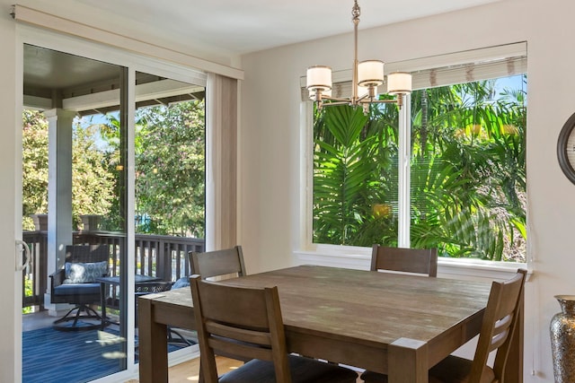 dining room featuring a chandelier and a wealth of natural light