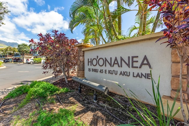 community sign featuring a mountain view