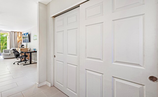 interior space with light tile patterned floors