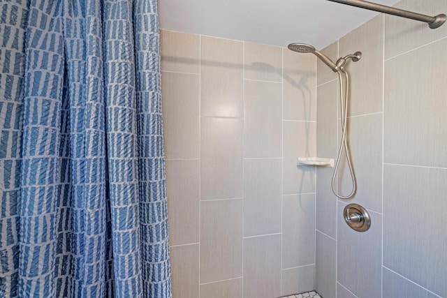 bathroom featuring a stall shower