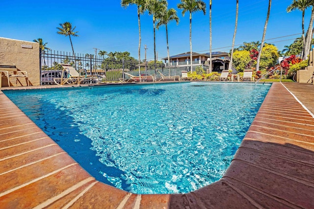 pool featuring fence