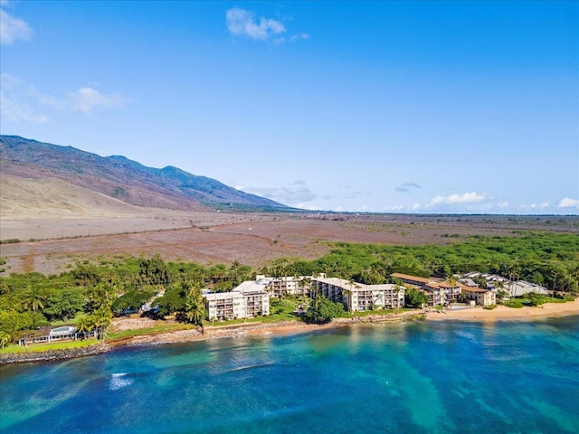 drone / aerial view featuring a mountain view