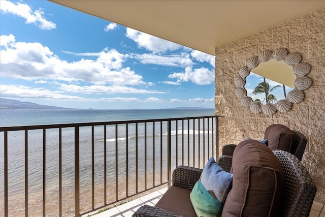 balcony featuring a water view