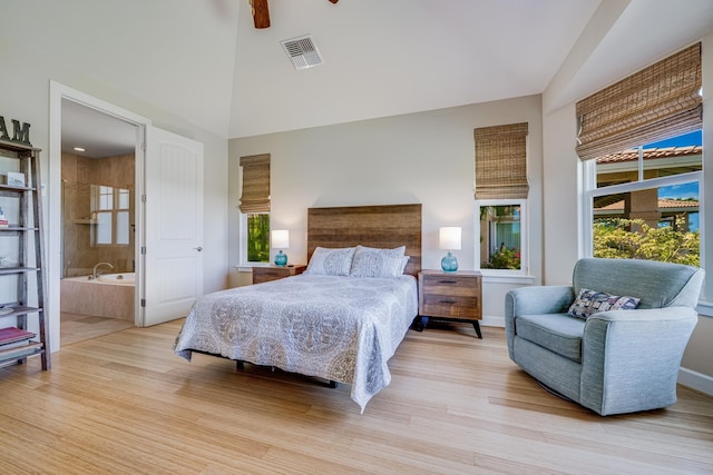 2177 Hihimanu St Unit 121, Kihei, HI 96753 - bedroom with ceiling fan, ensuite bathroom, light hardwood / wood-style flooring, and lofted ceiling