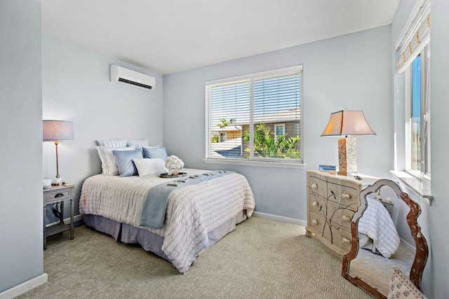 bedroom with light carpet and a wall mounted air conditioner