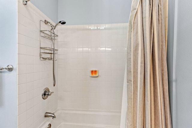 bathroom featuring shower / bath combination with curtain