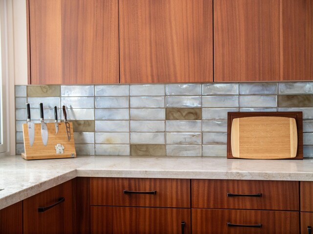 kitchen featuring light stone countertops