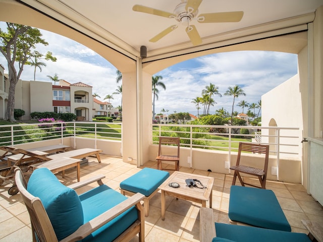 view of patio / terrace featuring a balcony and ceiling fan